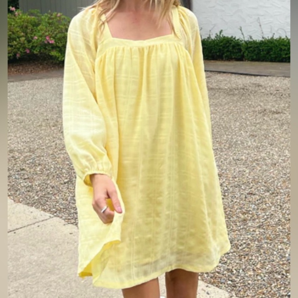 Yellow long sleeve dress.